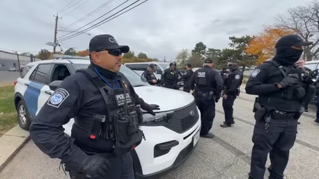 CBP officers form a perimeter around the raided warehouse. COSECHA NEW JERSEY/Facebook Live
