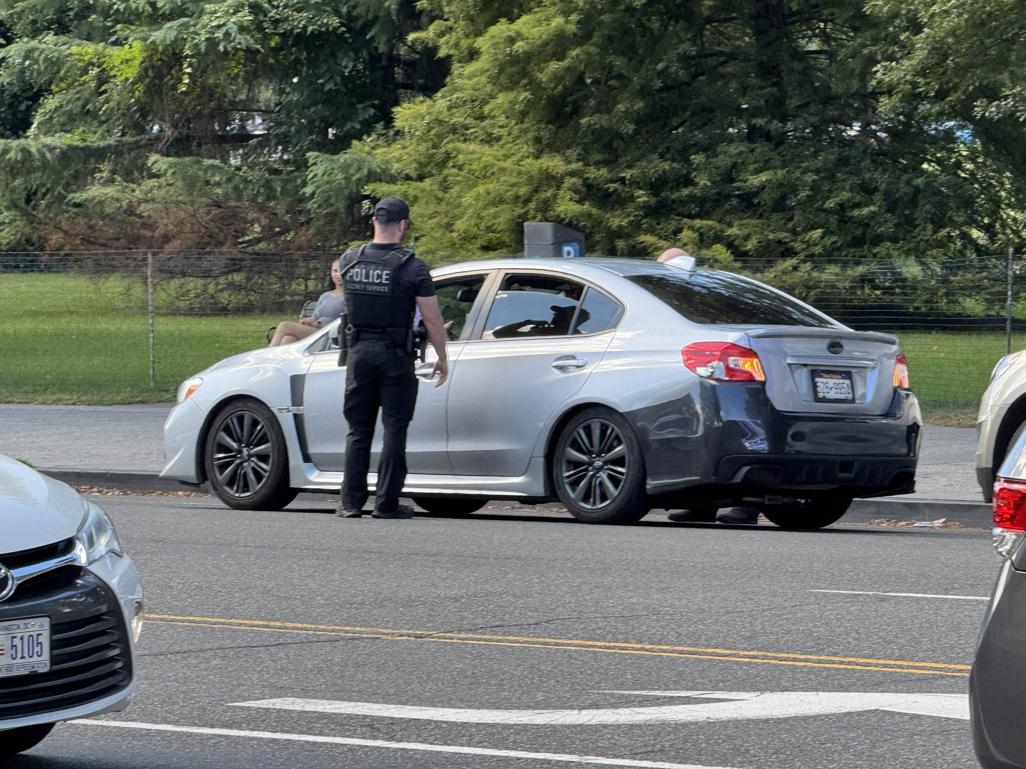 Uniformed U.S. Secret Service officers conduct a traffic stop beside the Washington Monument on Tuesday, Aug. 26. ZFJ/Alvin Wu