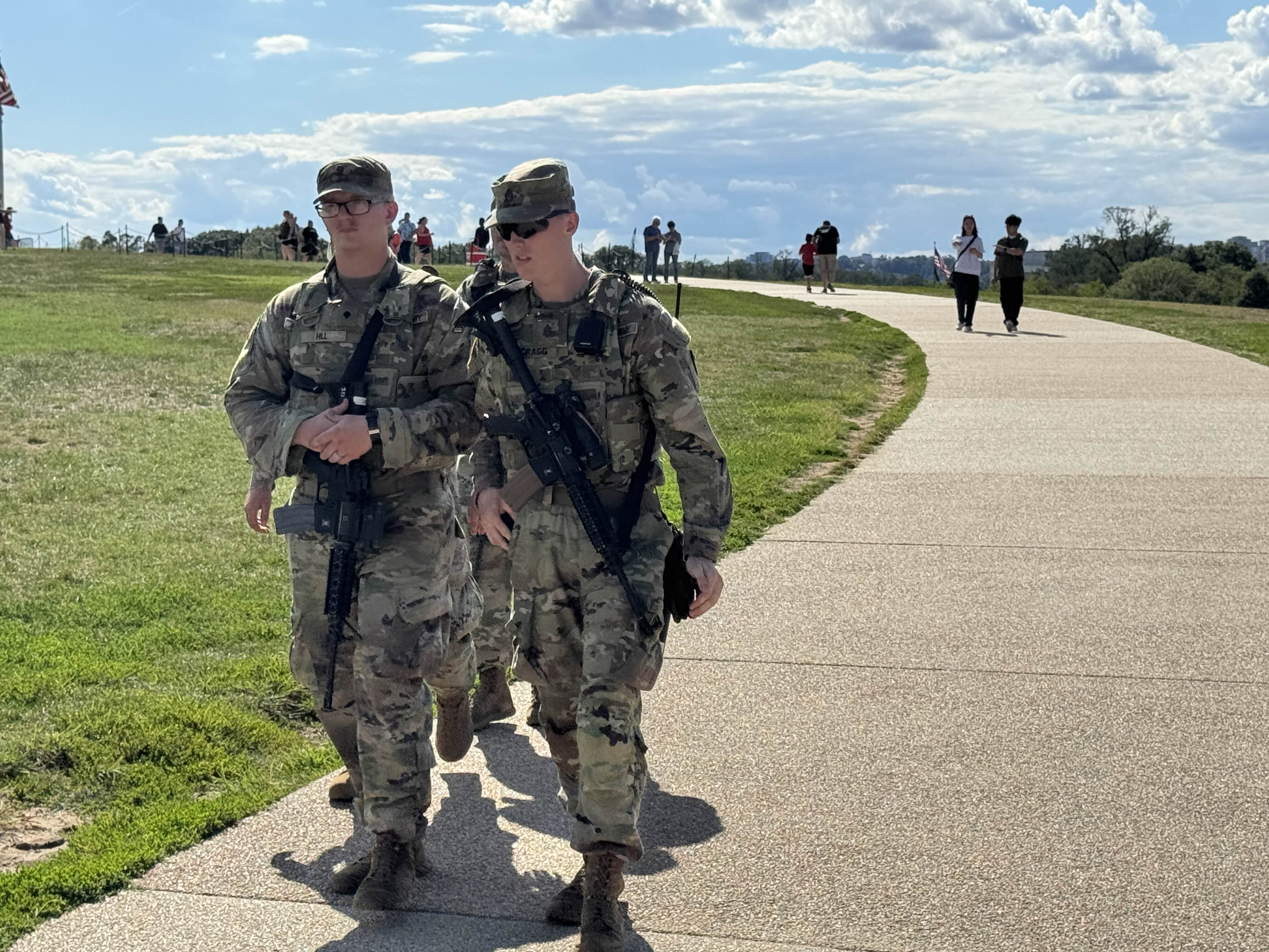 Patrolling DC National Guard soldiers now armed with rifles, pistols
