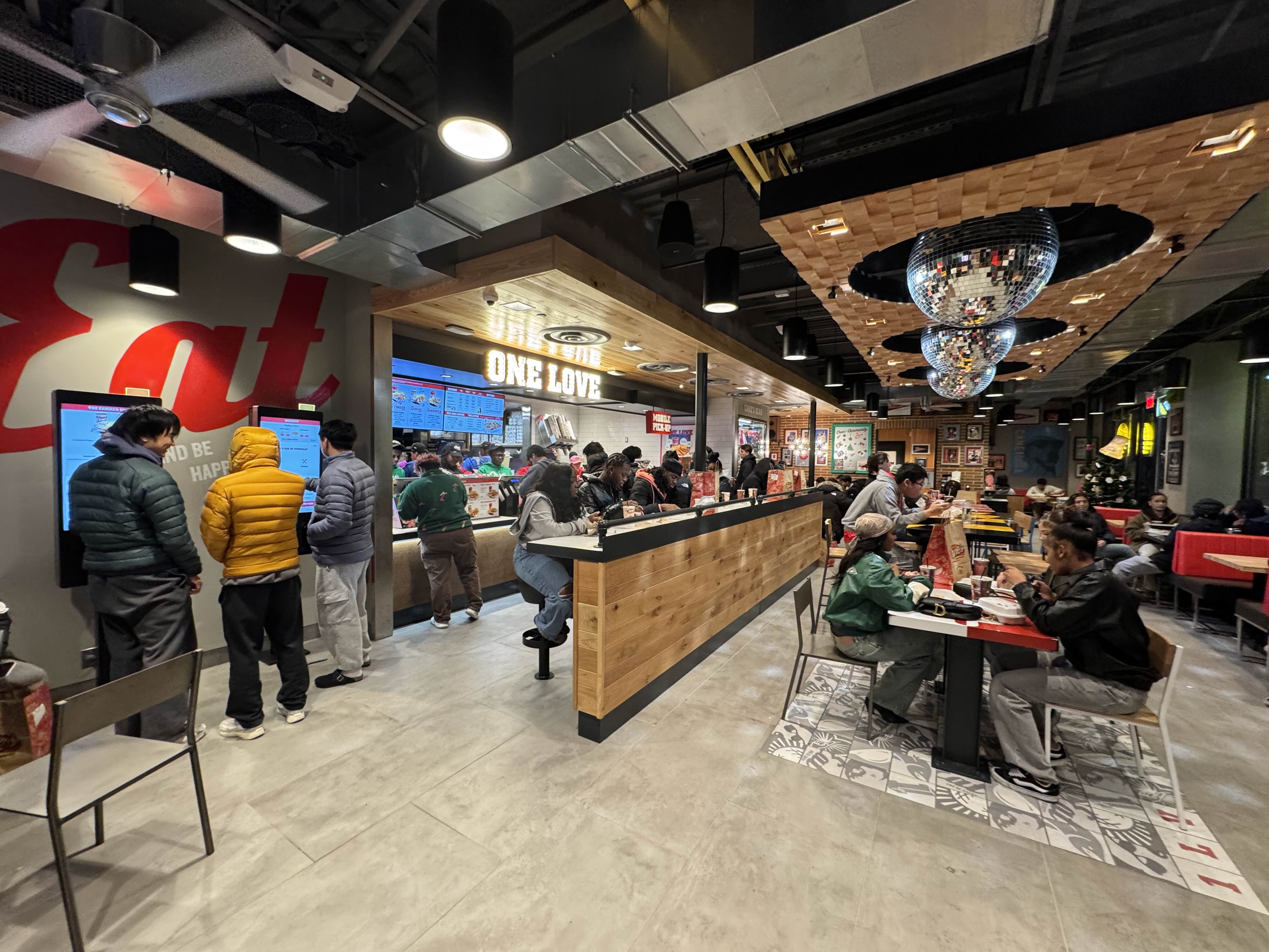 The interior of Raising Cane&rsquo;s in College Park midnight on opening day, Dec. 9, 2025. ZFJ/Alvin Wu
