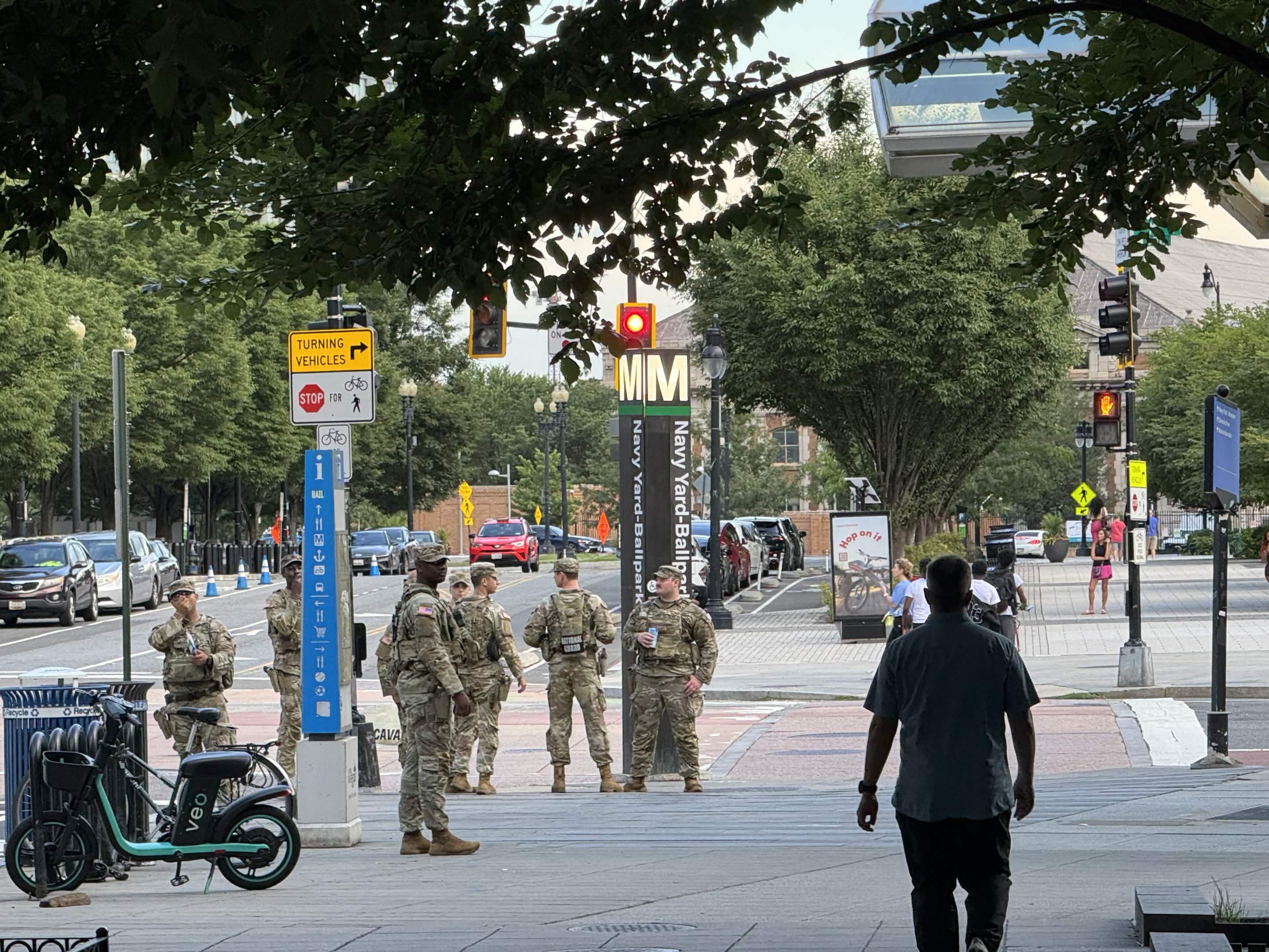 National Guardsmen stand outside of the entrance to the Navy Yard-Ballpark Metro station on Aug. 6, 2026. ZFJ/Alvin Wu